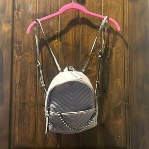 NWT Victoria’s Secret grey and chrome small backpack approx 9”x9”x4”
